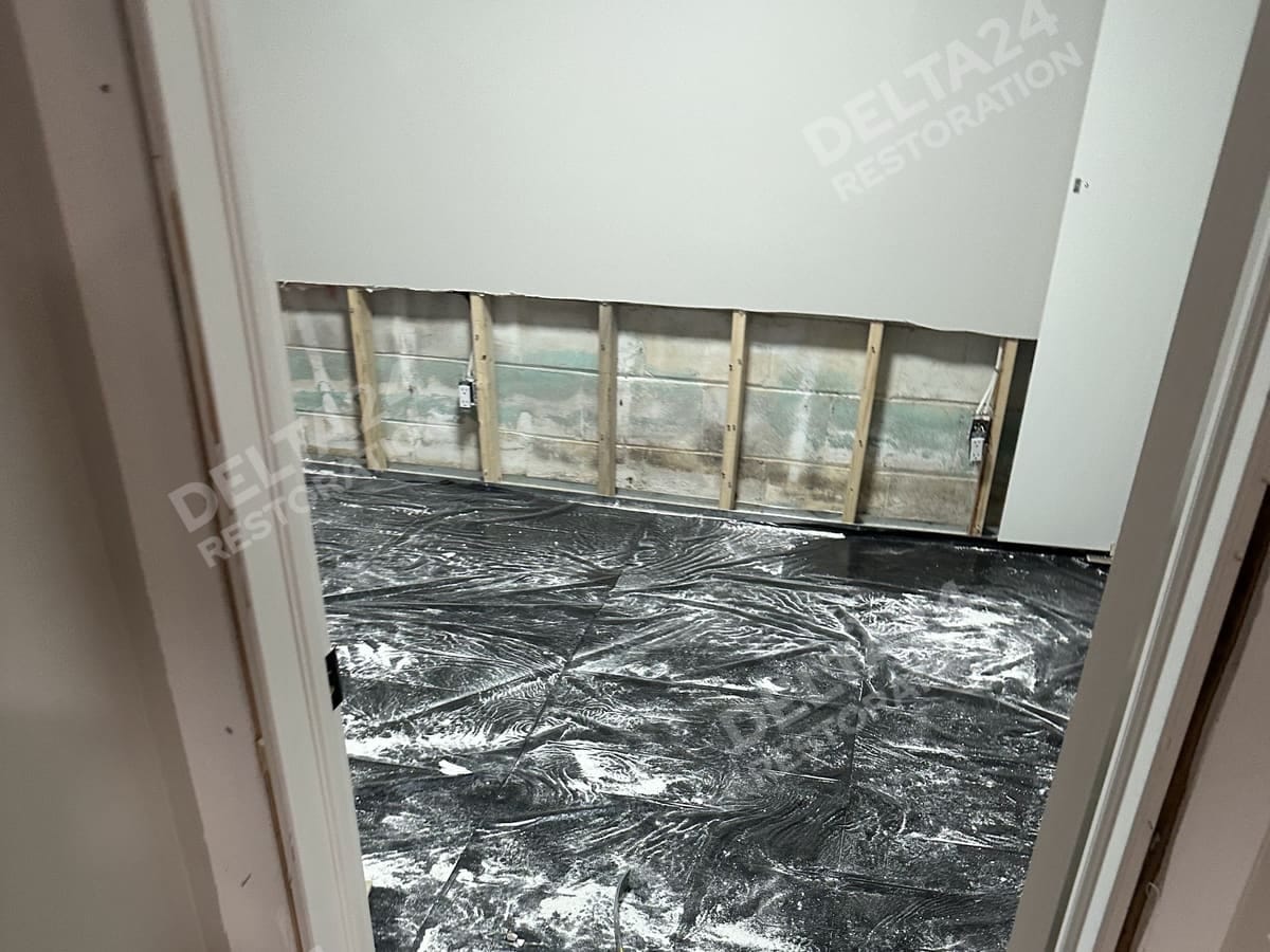 Drywall cut out around the base of the walls