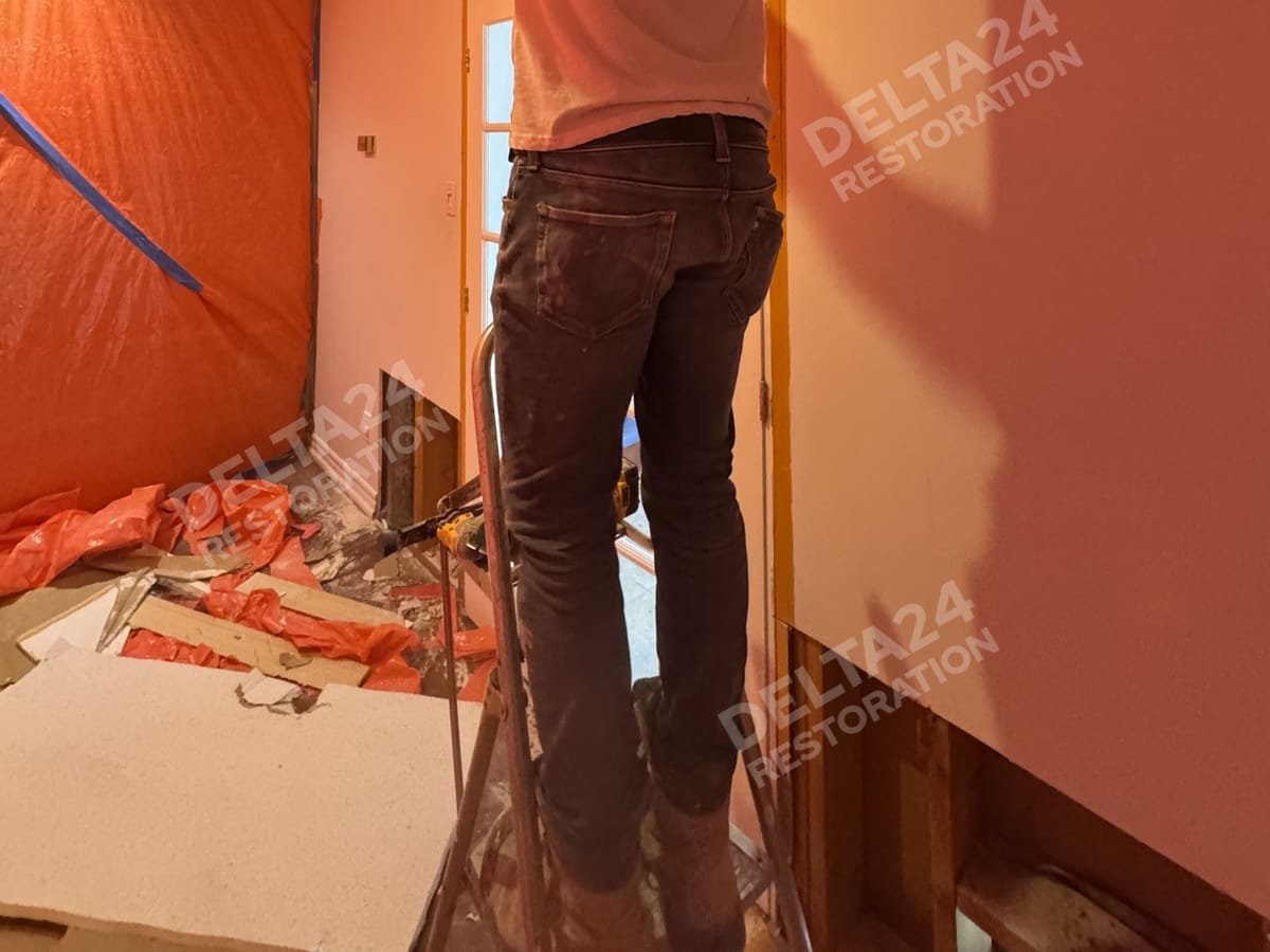 Opening the ceiling where water had reached it