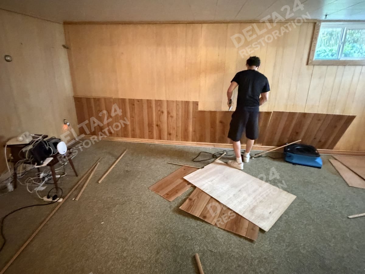 Putting the panelling back once the walls were dry